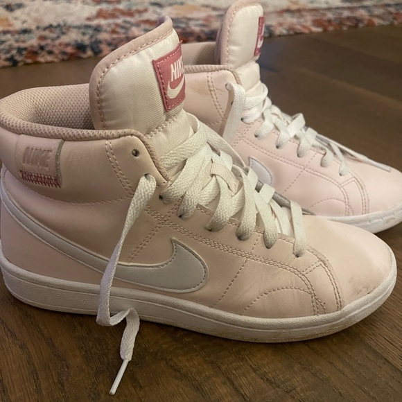 black and pink nike high tops